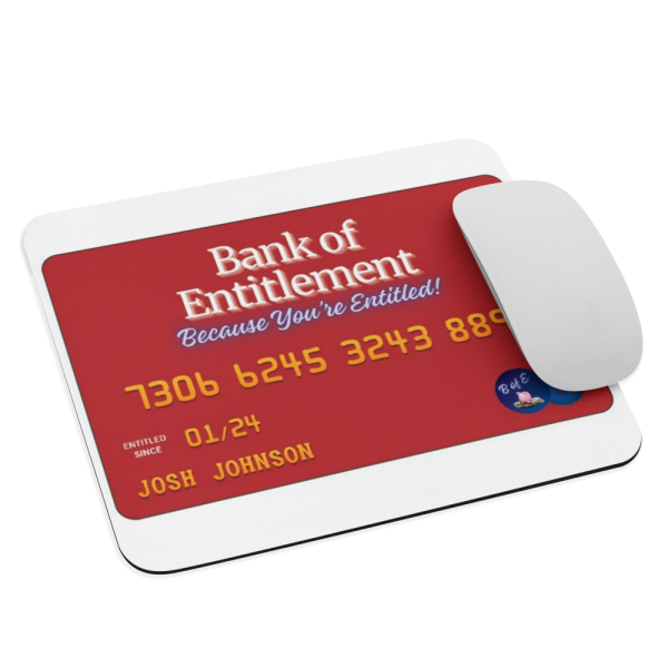 A red credit card with a white mouse pad.